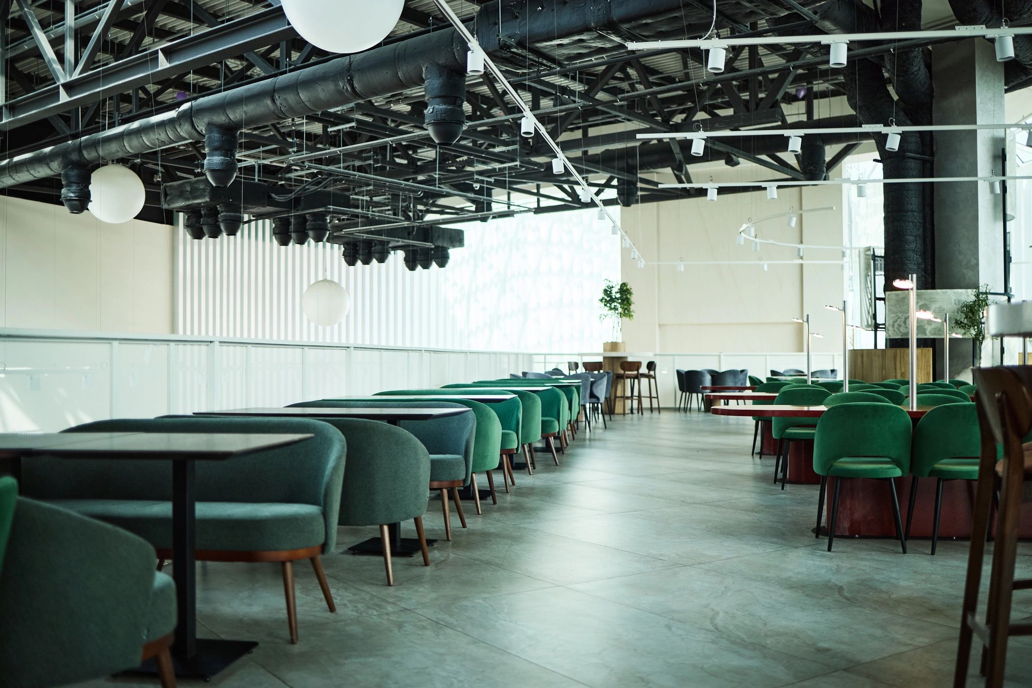 Warm modern cafe interior with spacious seating